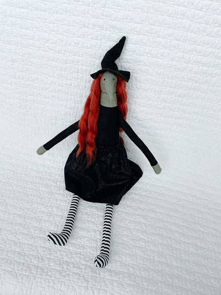 Witch with long red hair