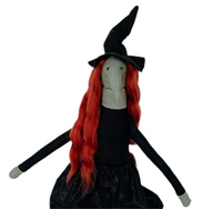 Witch with long red hair